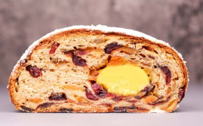 Venezuelan cuisine: Christmas loaf pan de jamon close-up. Vertical